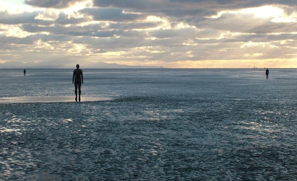 Antony Gormley's 'Another Place' - multiple life-size iron men on Crosby beach